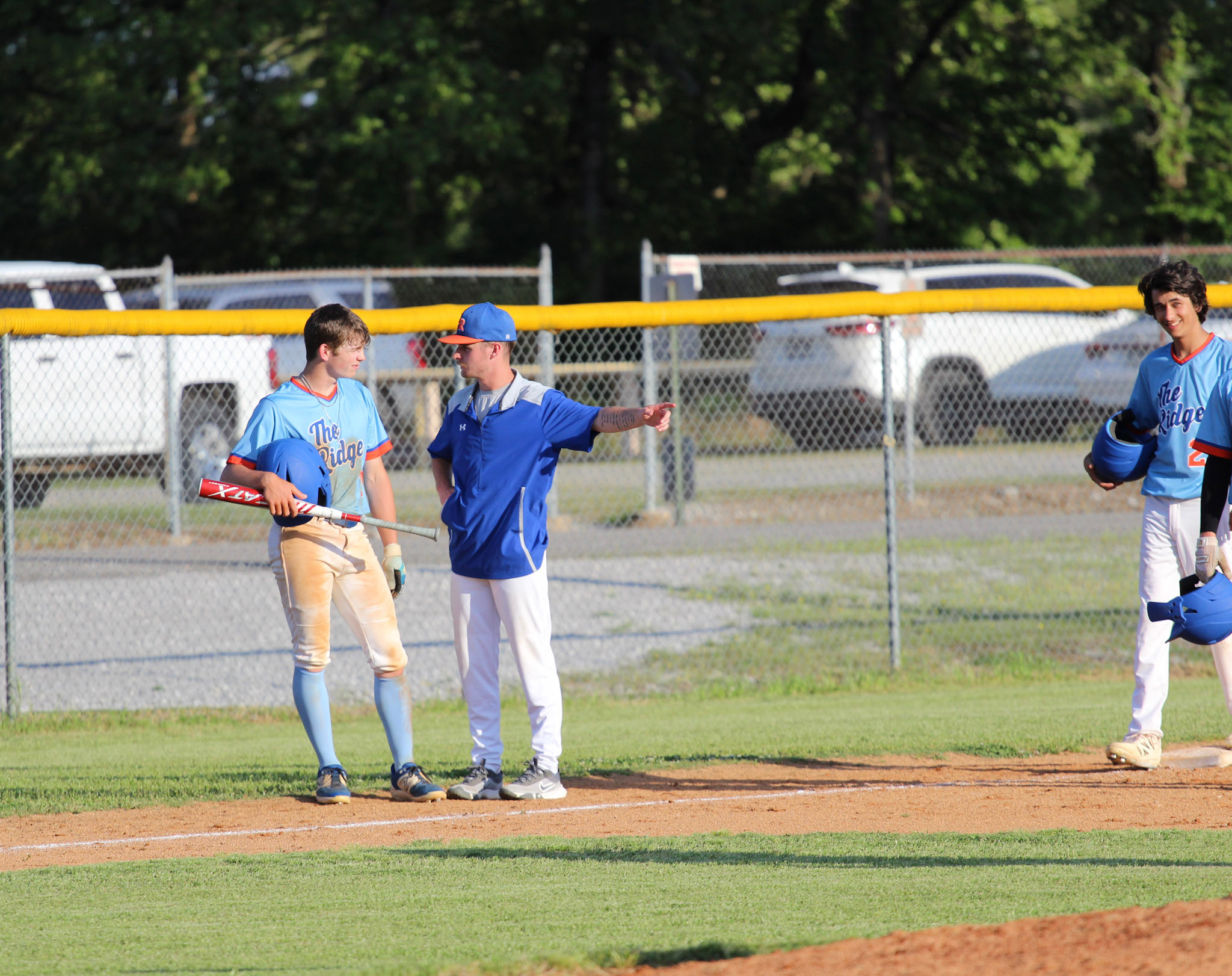 Austin coaching baseball players